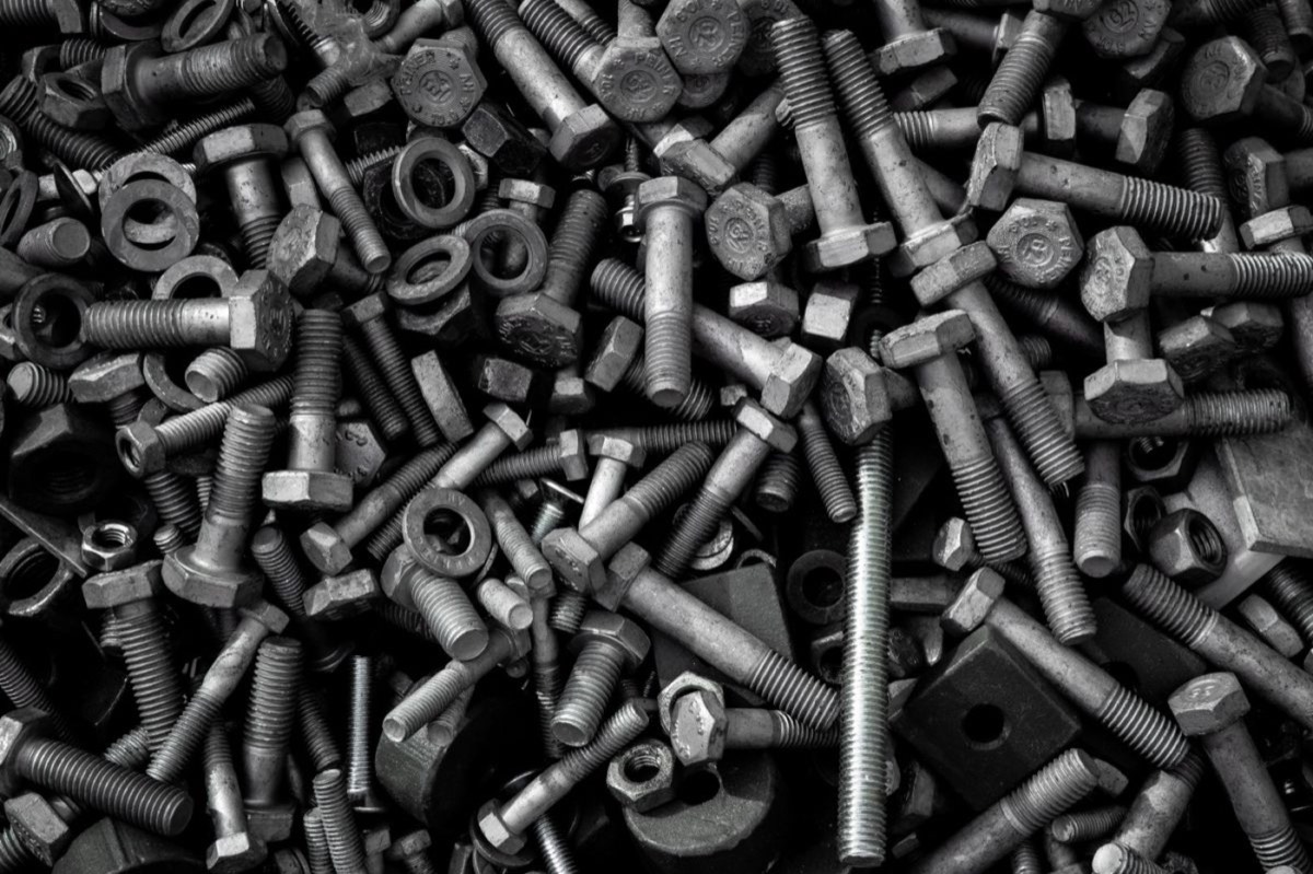Steel fasteners before acid wash and degreasing - surface preparation services in Nashik